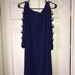 A navy blue dress with glam  down the sleeves